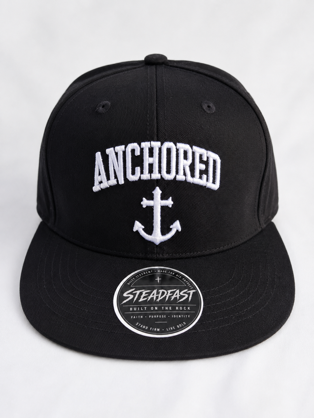 ANCHORED SNAPBACK